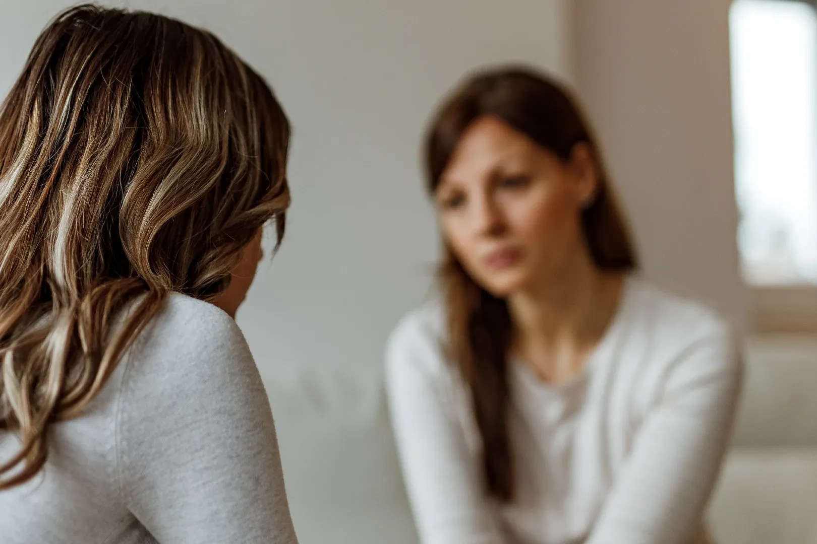 woman speaks to counsellor about fertility issues