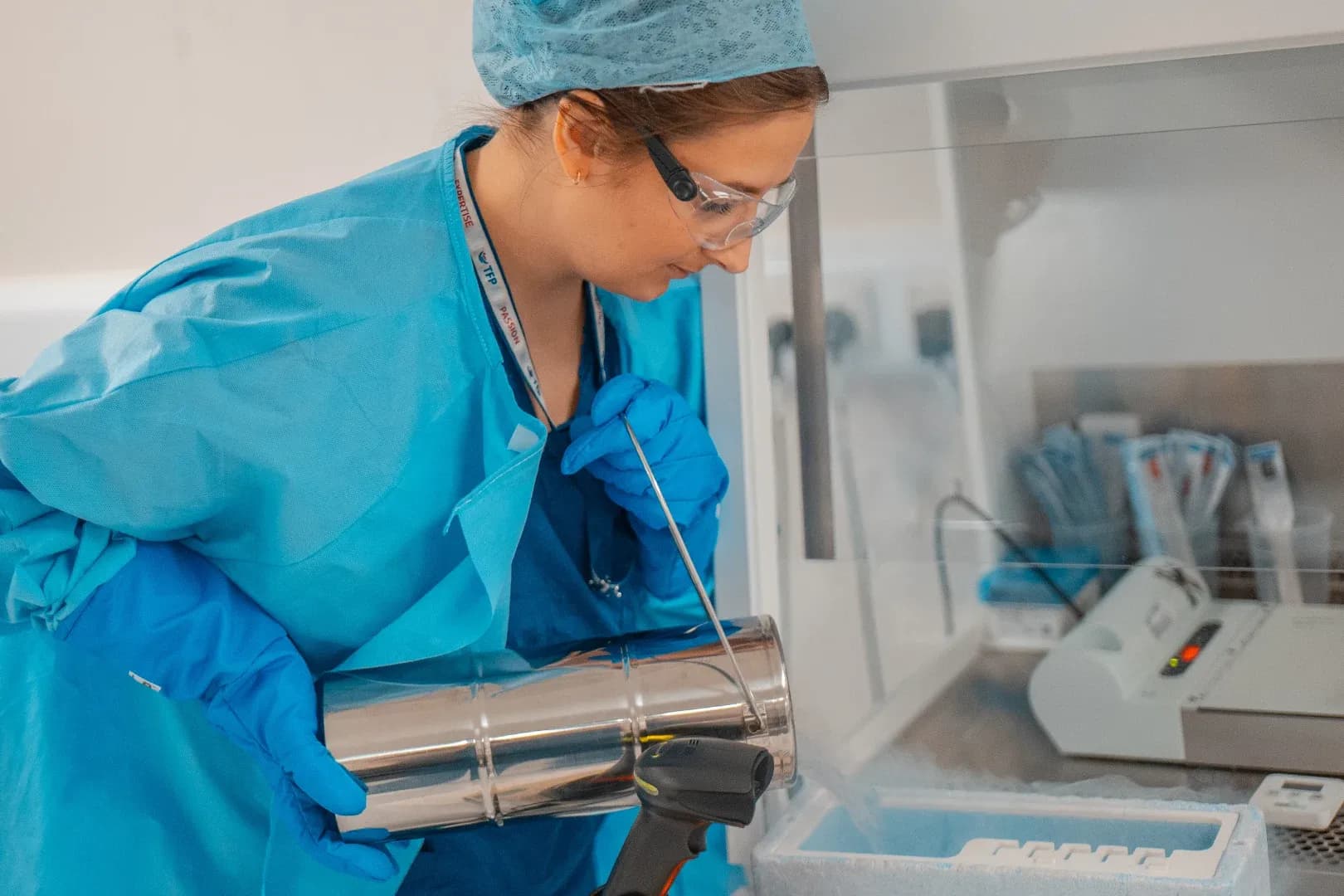 embryologist in lab freezing eggs