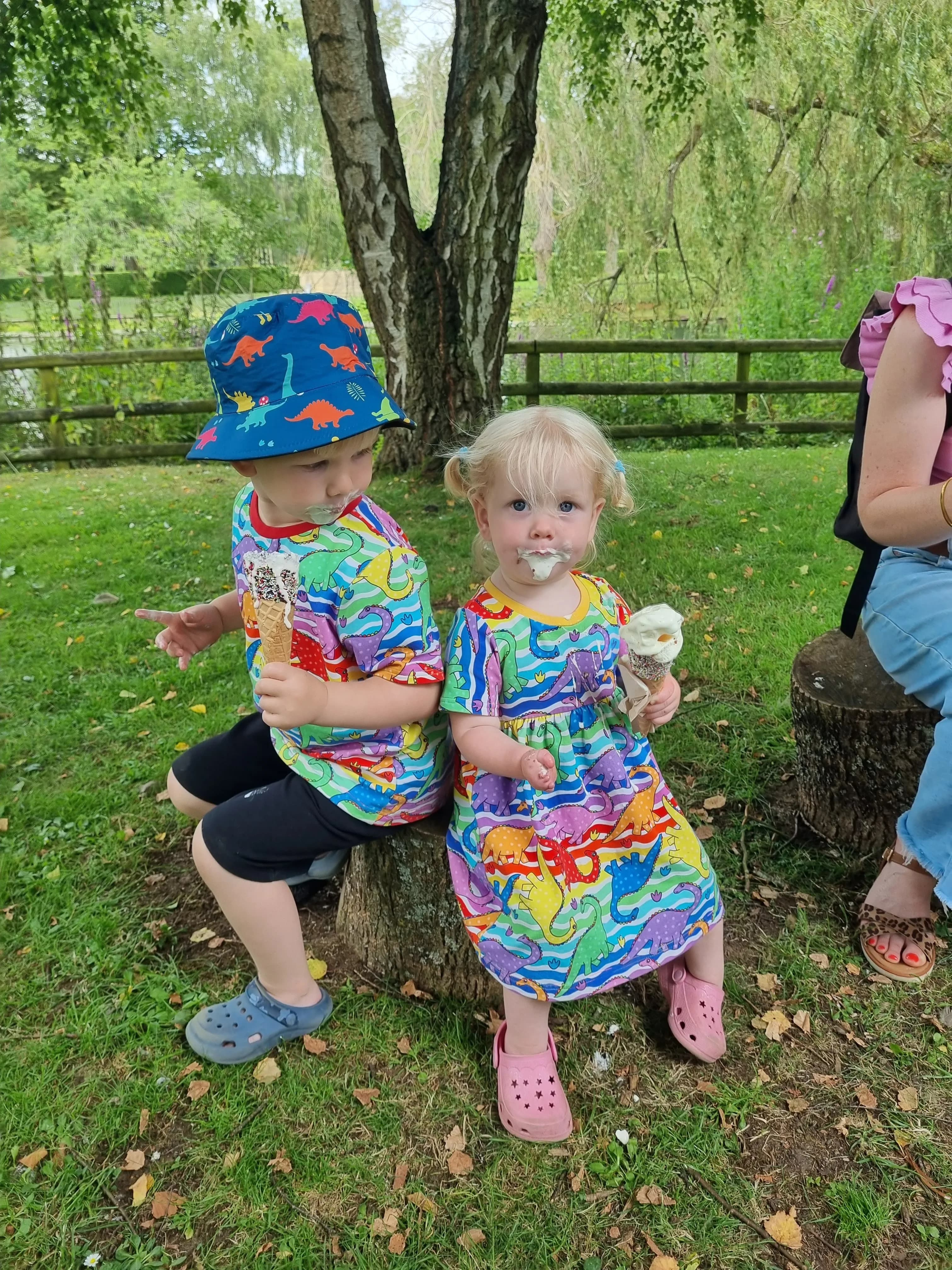 Two children eating ice cream