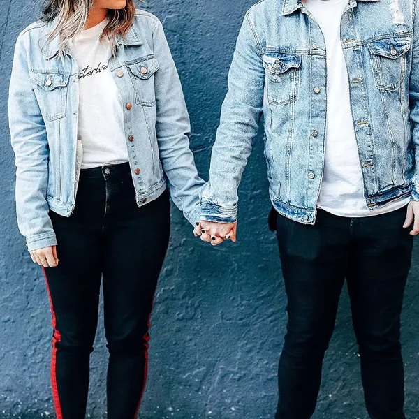 Couple hold hands
